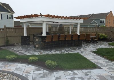 Pergola and outdoor Kitchen and Paver Patio