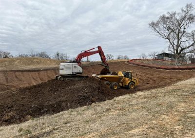 Removal of top soil before mass grading at catholic university